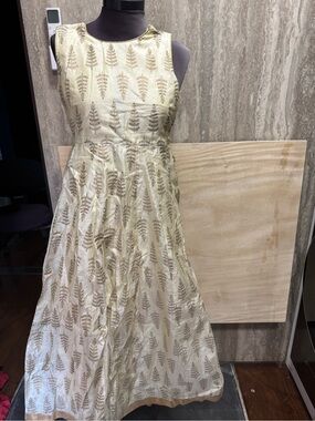 Indian dress with gold pants, Cream Sleeveless Embroidered A-Line Maxi Dress